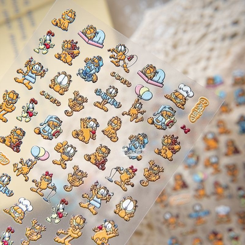 新しいガーフィールドネイルアートステッカー高色価値クリエイテ - Nail Art Design のレビューと価格