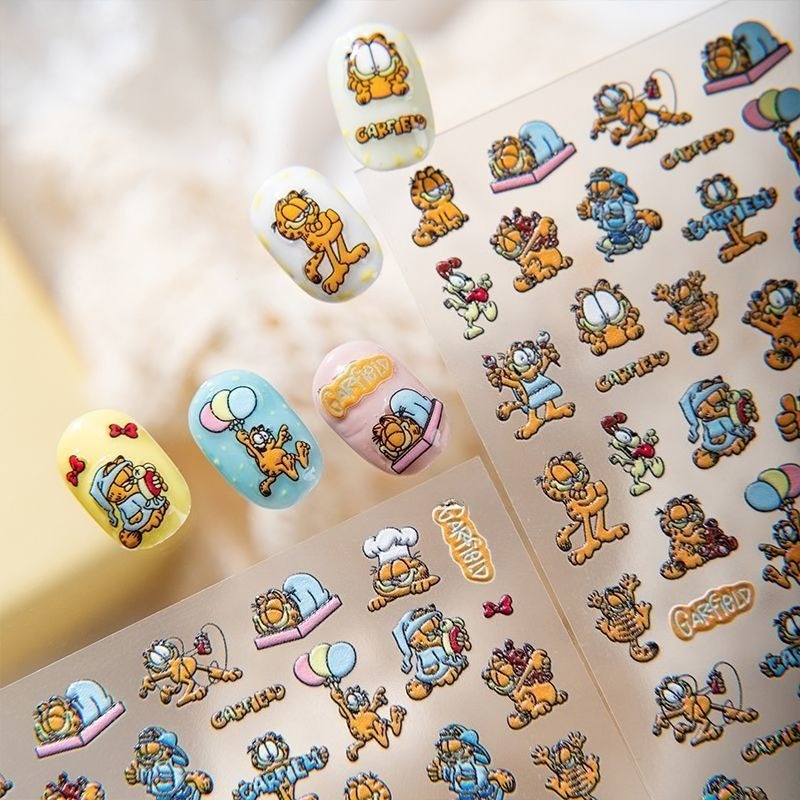 新しいガーフィールドネイルアートステッカー高色価値クリエイテ - Nail Art Design のレビューと価格